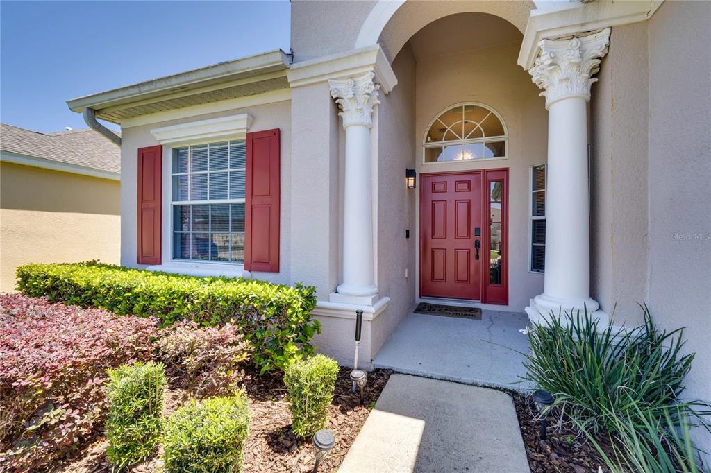 246 Montara Drive Davenport, FL 33897 - Photo 1 of 31 a front view of a house with garden