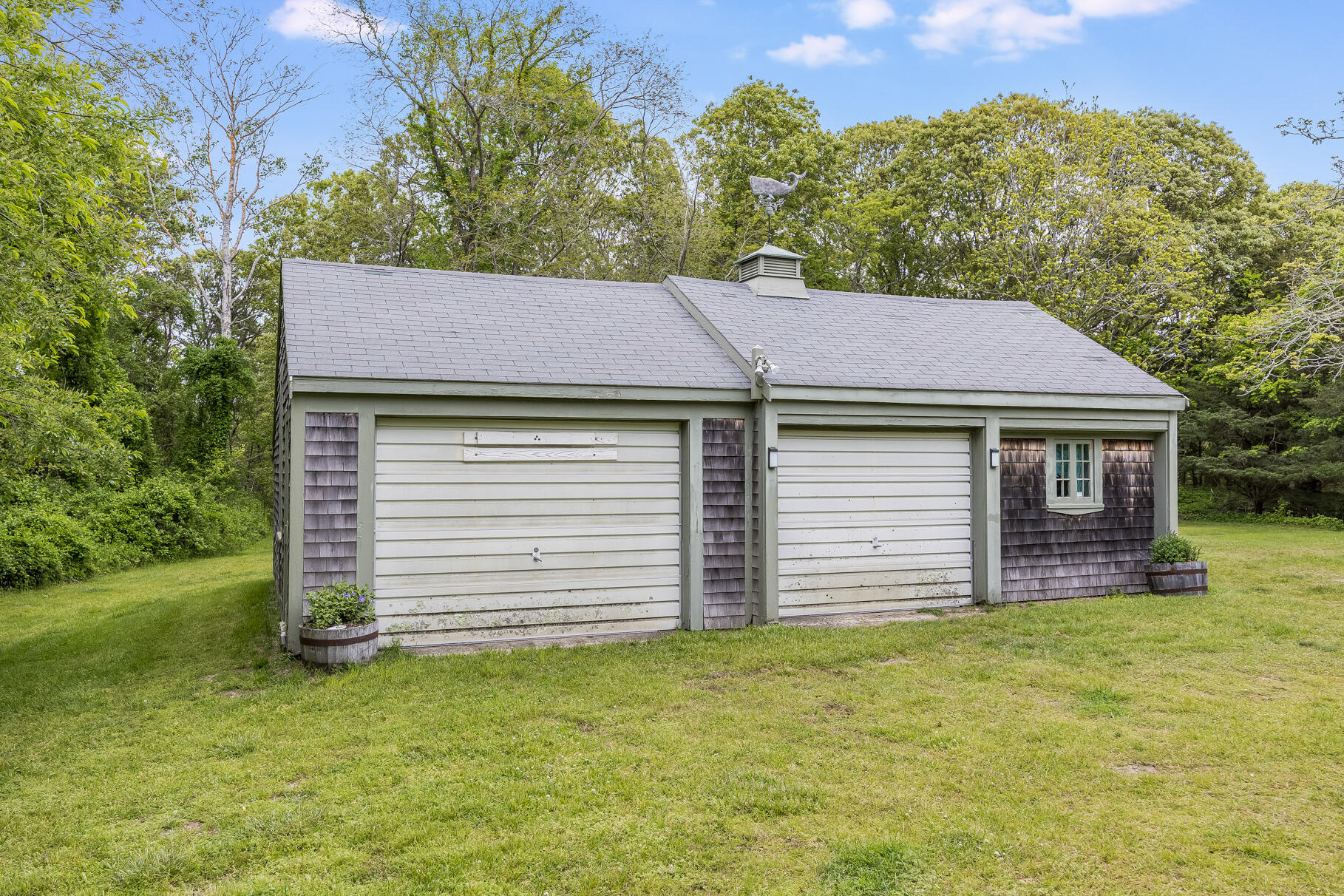 575 Nauset Road Eastham, MA 02642 - Photo 13 of 68 a front view of a house with a garden