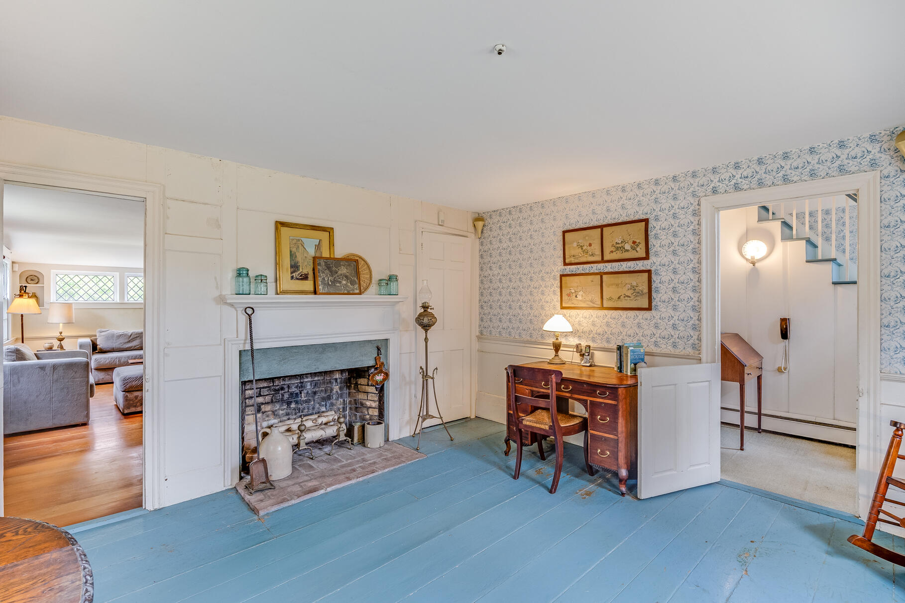 575 Nauset Road Eastham, MA 02642 - Photo 22 of 68 a living room with furniture and a fireplace