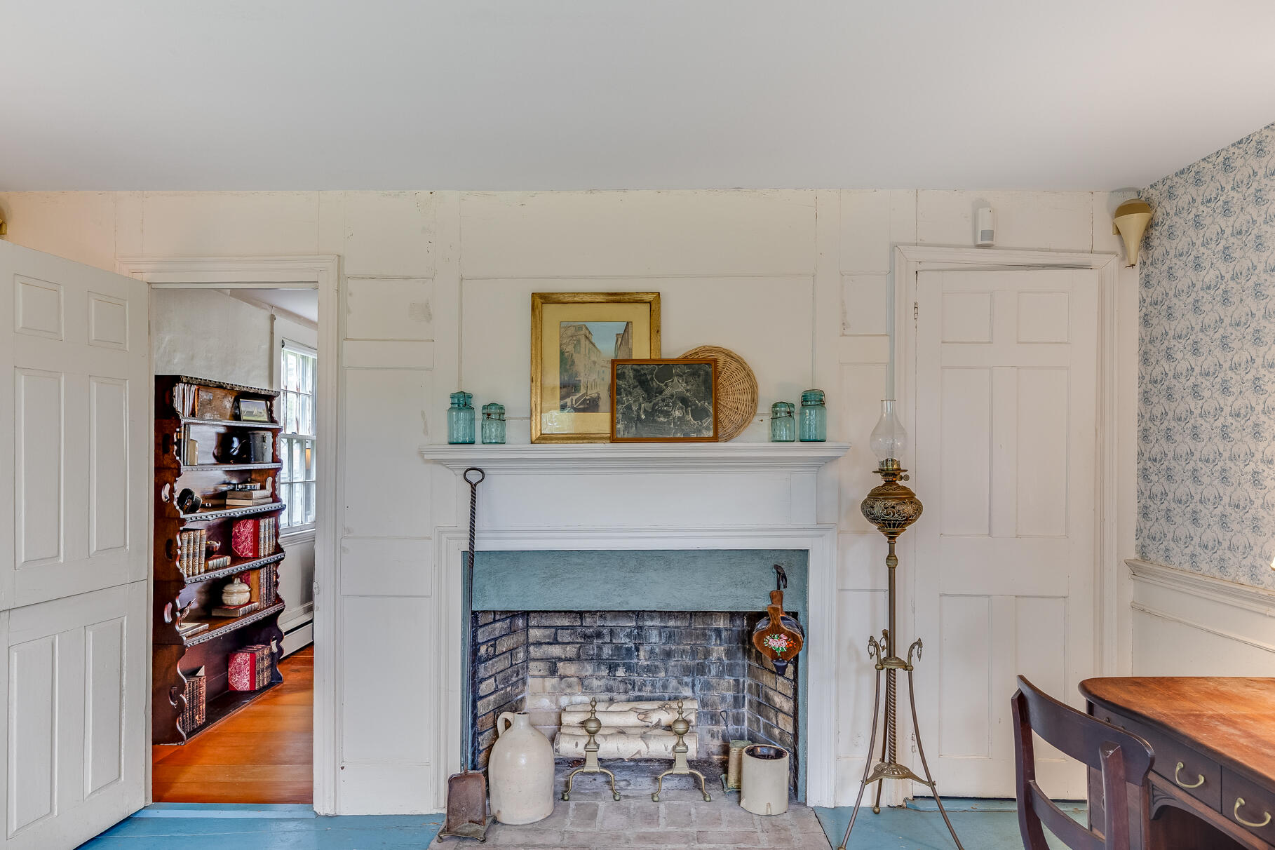 575 Nauset Road Eastham, MA 02642 - Photo 24 of 68 a living room with furniture and a fireplace