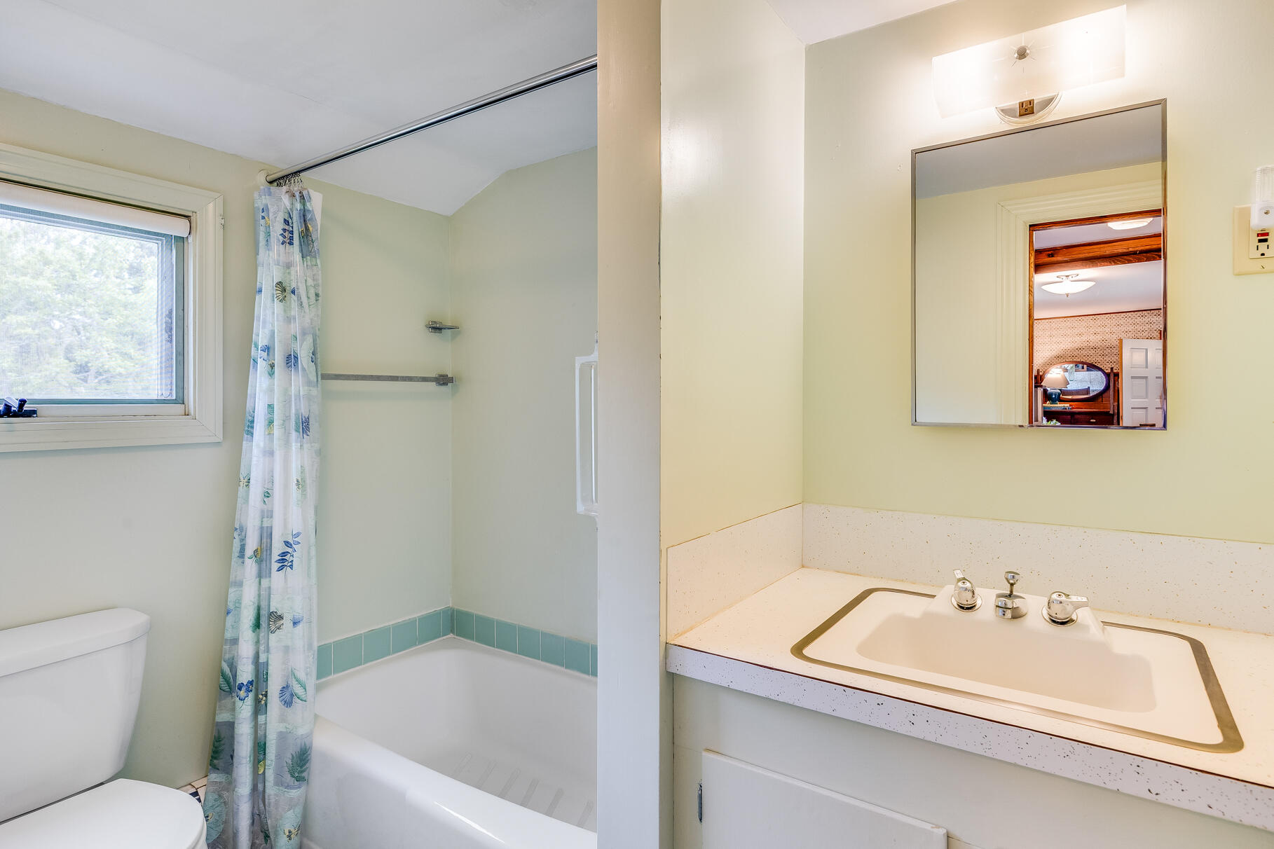 575 Nauset Road Eastham, MA 02642 - Photo 39 of 68 a bathroom with a tub sink and mirror