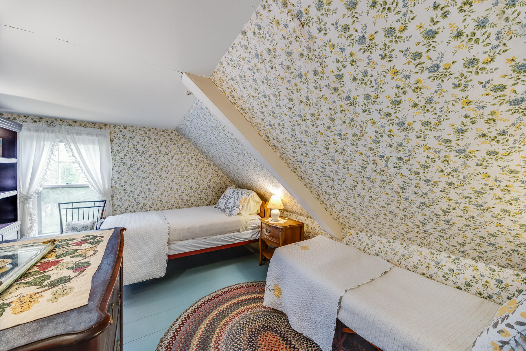 575 Nauset Road Eastham, MA 02642 - Photo 47 of 68 a living room with furniture and a fireplace