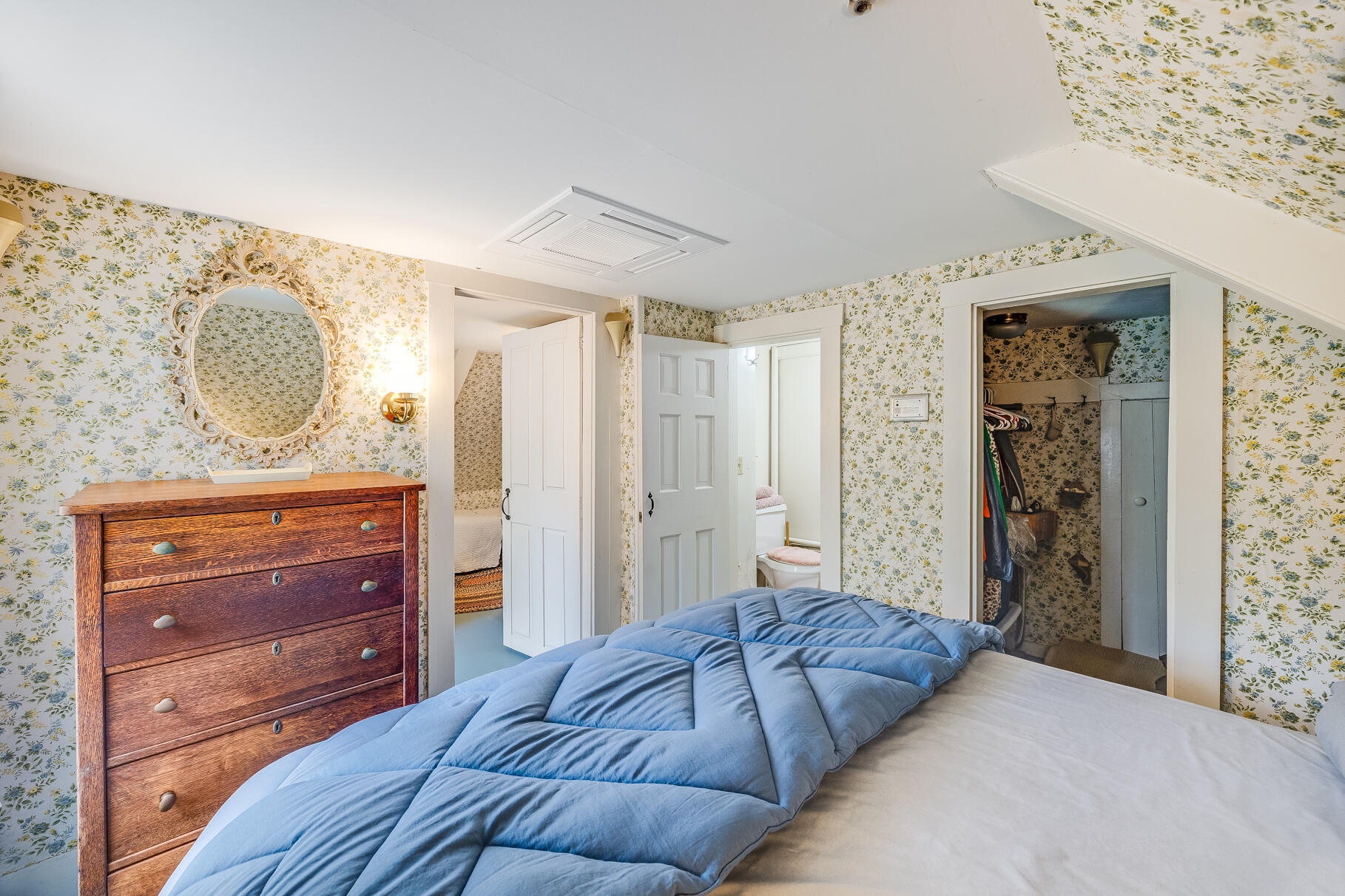 575 Nauset Road Eastham, MA 02642 - Photo 49 of 68 a bedroom with a bed and a dresser