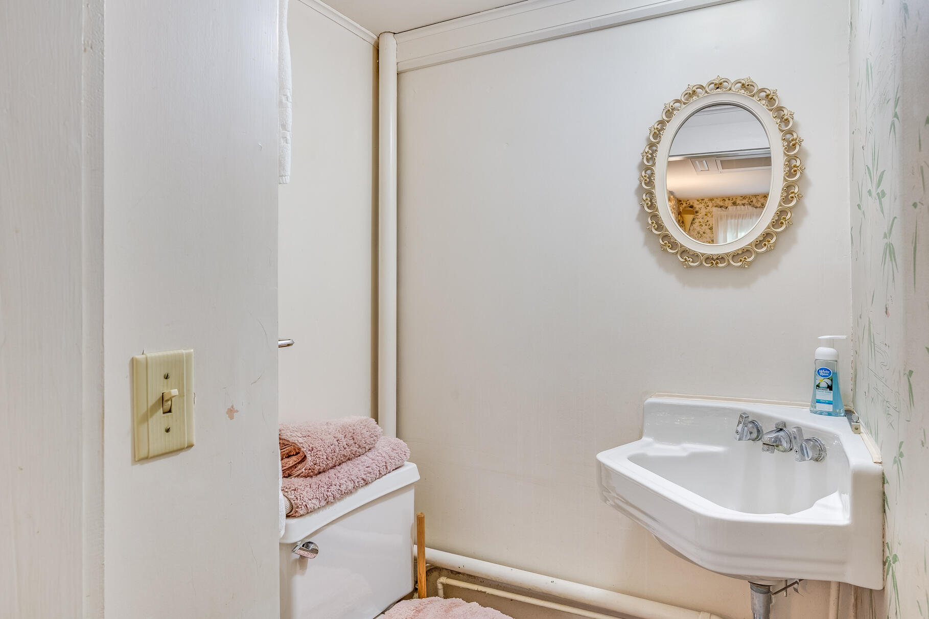 575 Nauset Road Eastham, MA 02642 - Photo 50 of 68 a bathroom with a sink and a mirror