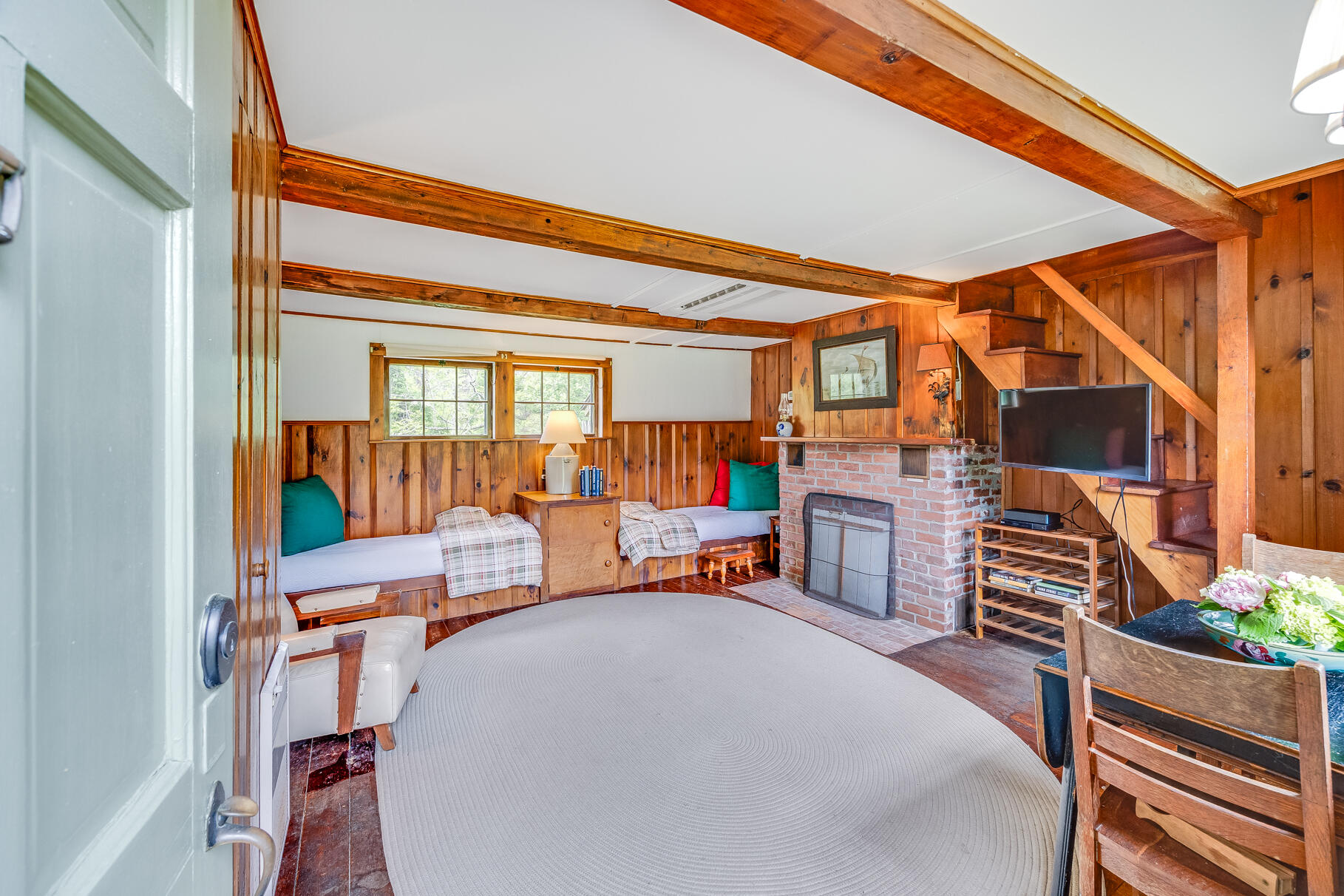 575 Nauset Road Eastham, MA 02642 - Photo 53 of 68 a bedroom with furniture and a large window