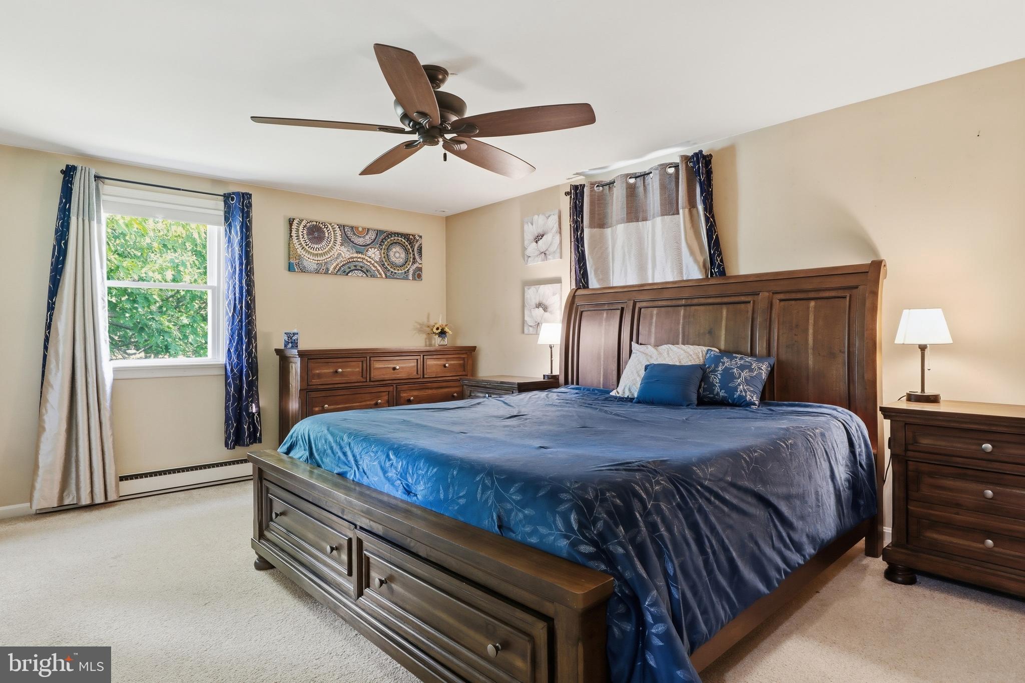 1072 Lambley Road Landisville, PA 17538 - Photo 46 of 46 a bedroom with a bed a dresser and a window