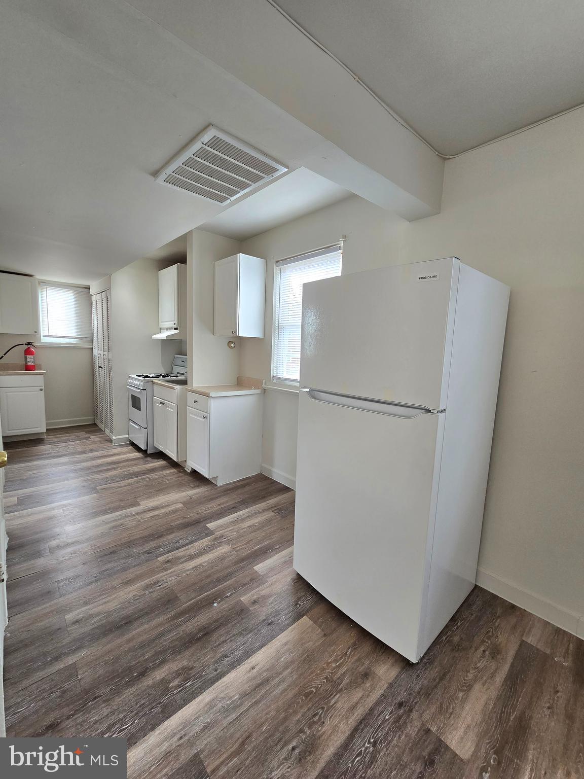 272 56th Street Northeast Washington, DC 20019 - Photo 8 of 13 a view of kitchen and refrigerator