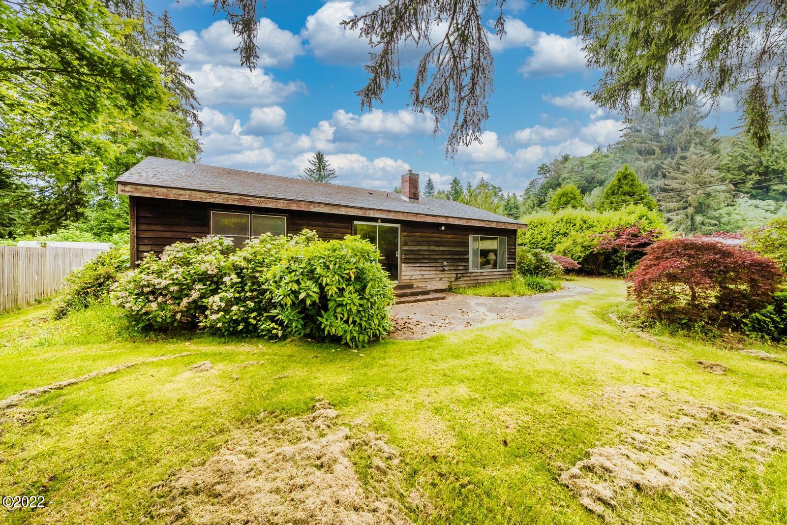 2420 North North Bank Road Otis, OR 97368 - Photo 24 of 30 2420 Backyard to house
