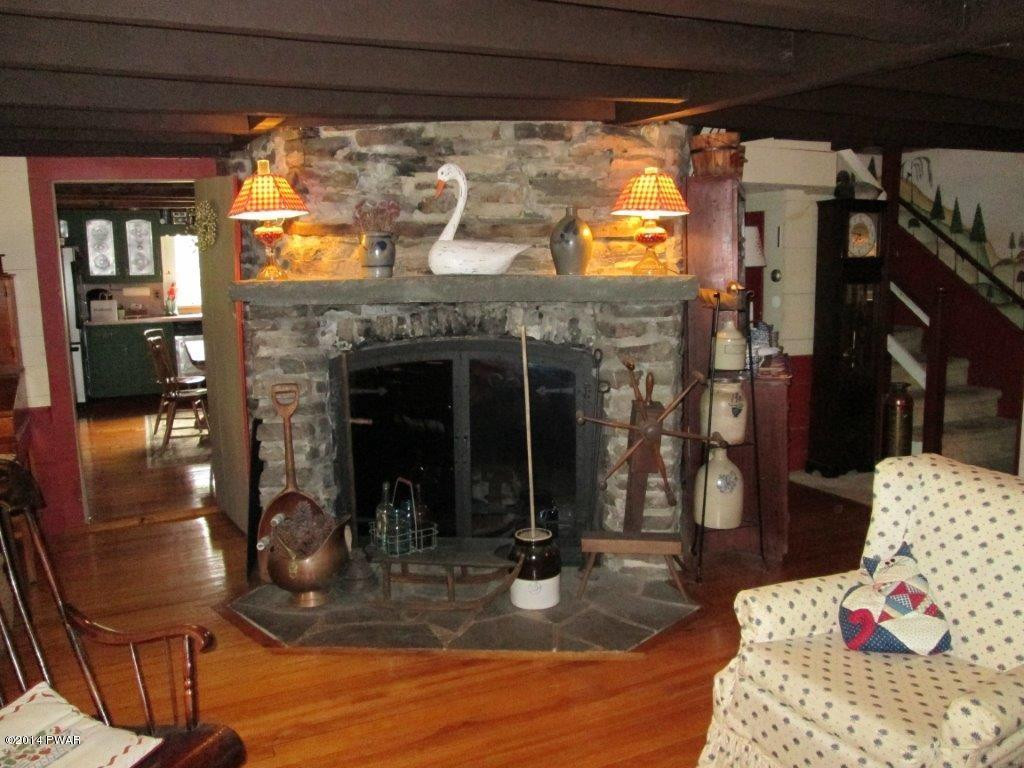 877 Welcome Lake Road Hawley, PA 18428 - Photo 19 of 78 STONE FIREPLACE