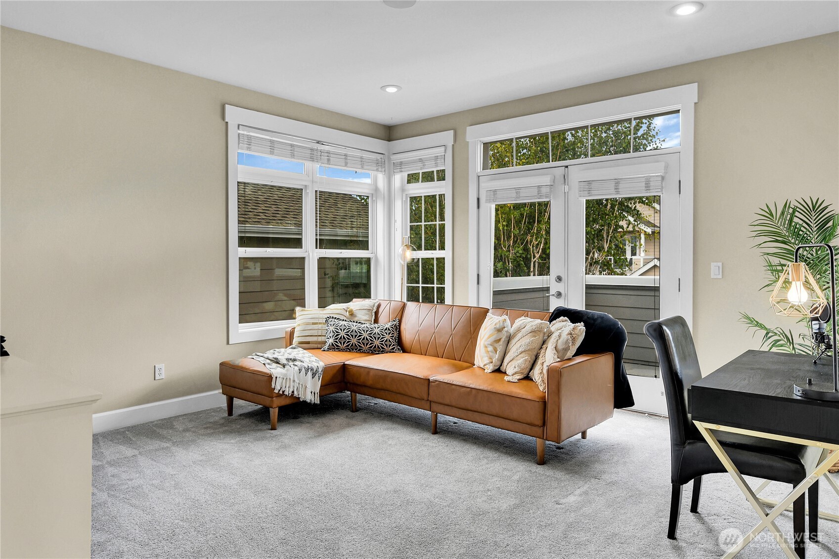 1011 North 27th Place Renton, WA 98056 - Photo 18 of 40 a living room with furniture and a large window