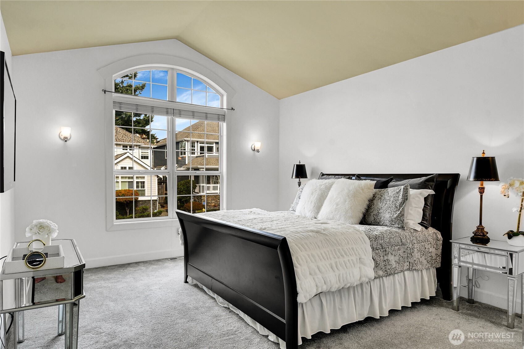 1011 North 27th Place Renton, WA 98056 - Photo 20 of 40 a bedroom with a bed and a window