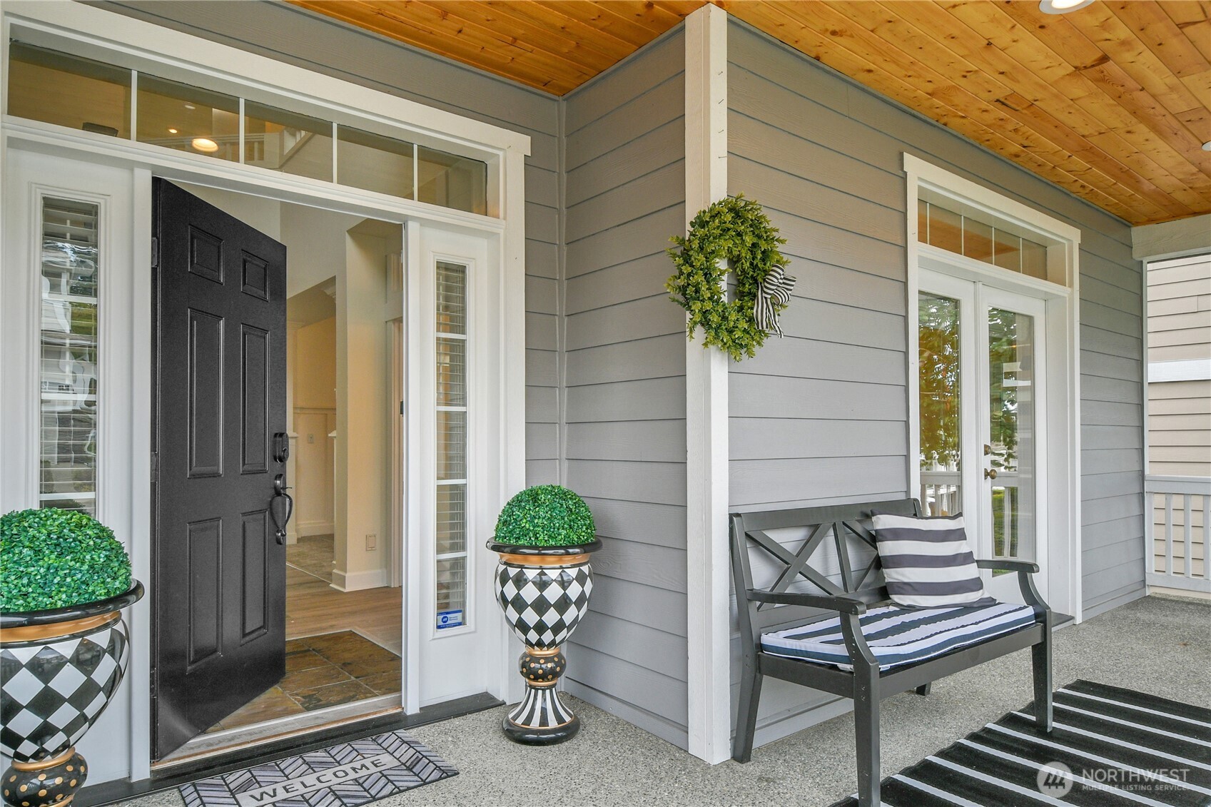 1011 North 27th Place Renton, WA 98056 - Photo 2 of 40 a front view of a house with outdoor seating