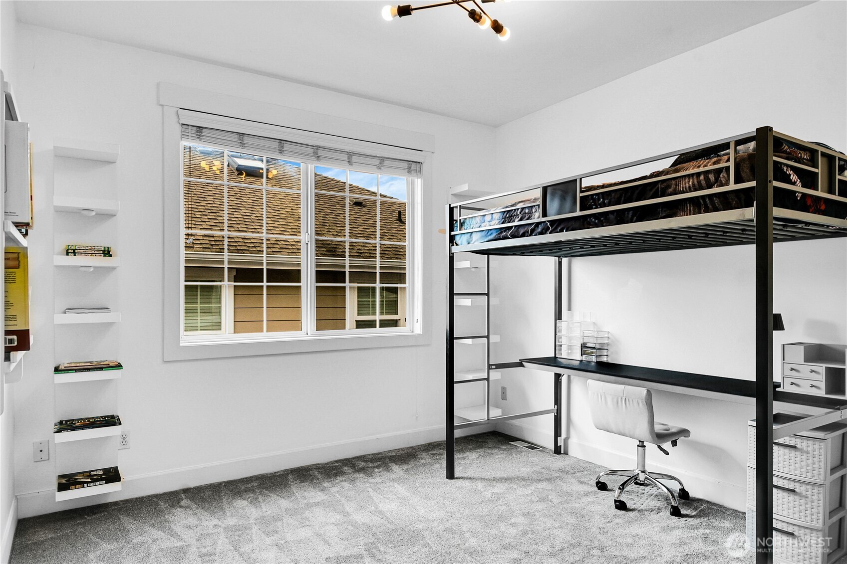 1011 North 27th Place Renton, WA 98056 - Photo 27 of 40 a view of an empty room with a window