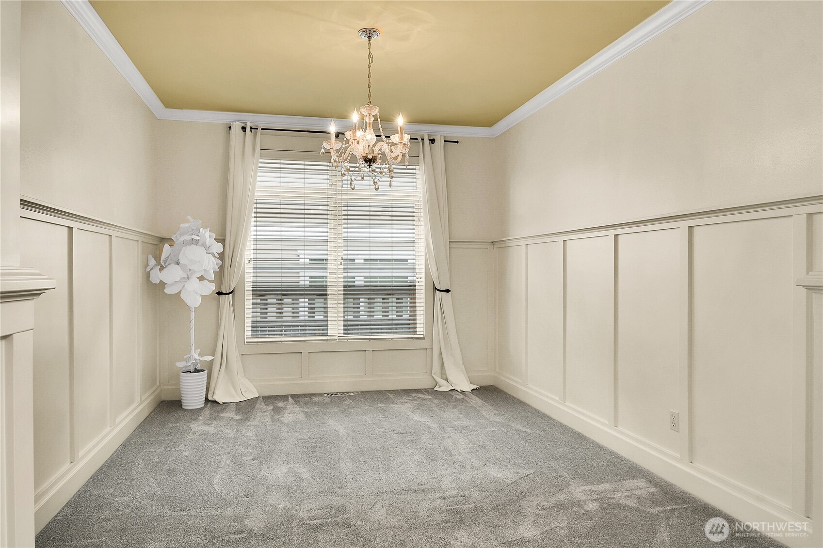 1011 North 27th Place Renton, WA 98056 - Photo 5 of 40 a view of an empty room with a window