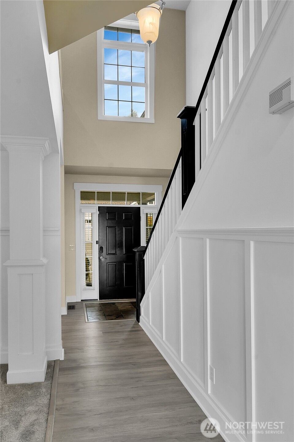 1011 North 27th Place Renton, WA 98056 - Photo 7 of 40 a view of entryway and hall with wooden floor