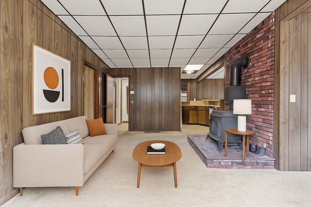 7 Hickory Lane Lunenburg, MA 01462 - Photo 17 of 40 a living room with furniture and a kitchen