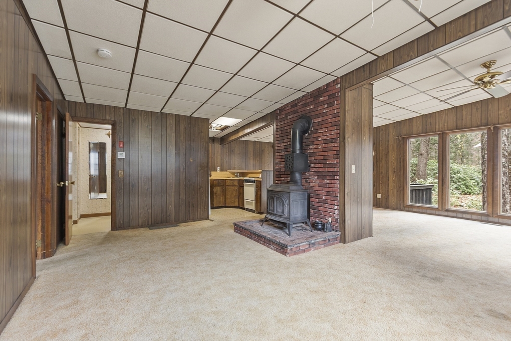 7 Hickory Lane Lunenburg, MA 01462 - Photo 20 of 40 a view of an empty room with a fireplace