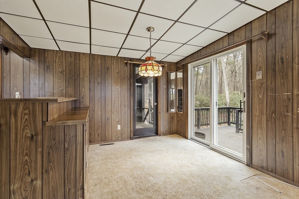 7 Hickory Lane Lunenburg, MA 01462 - Photo 31 of 40 a view of a hallway with wooden walls