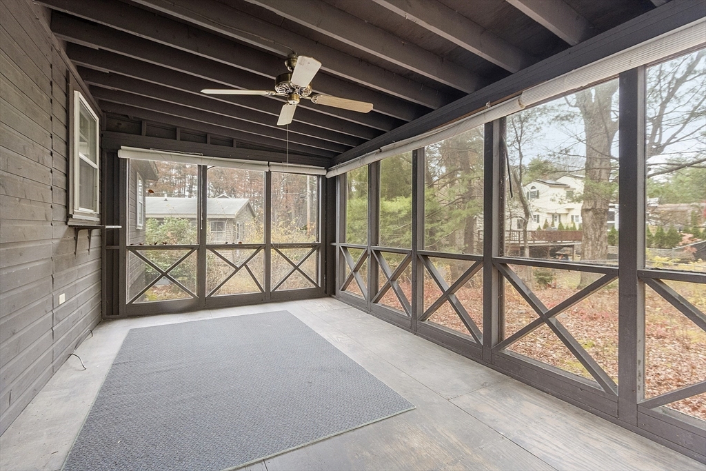 7 Hickory Lane Lunenburg, MA 01462 - Photo 40 of 40 a view of an empty room with furniture and large windows