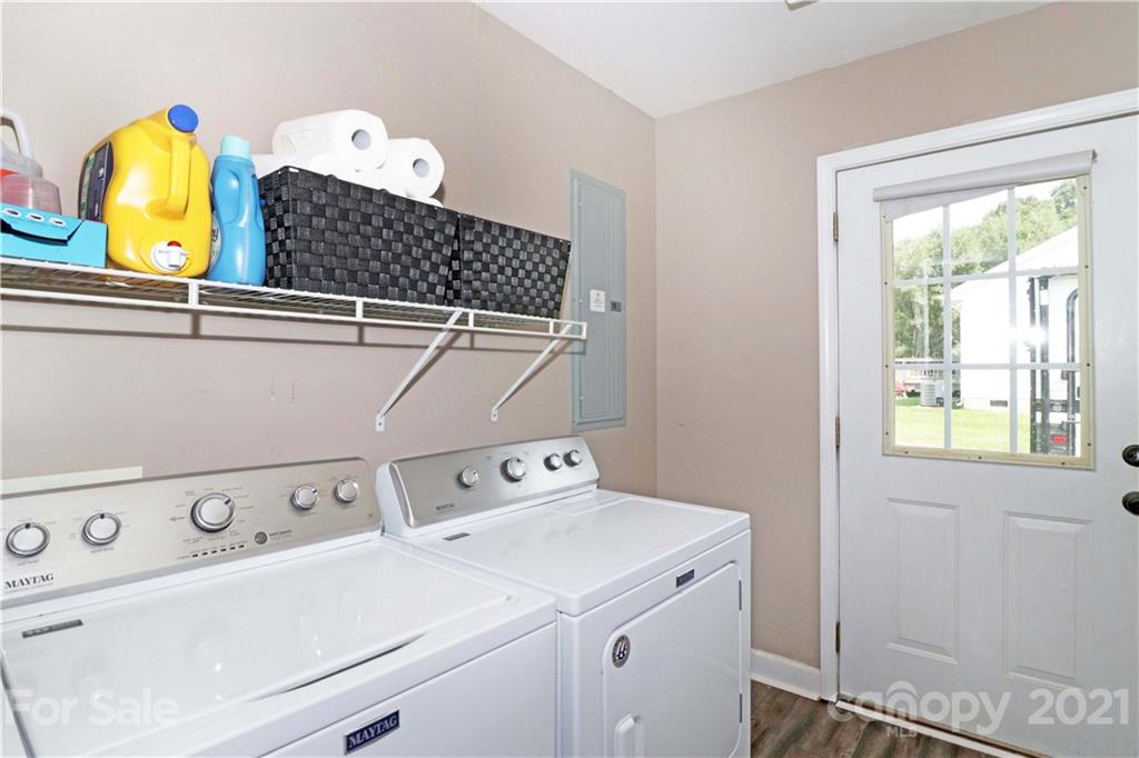 1045 Tabor Road Olin, NC 28660 - Photo 17 of 44 a utility room with dryer and washer