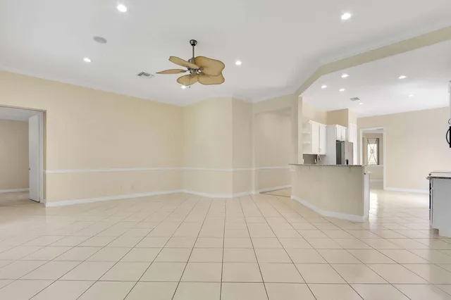 an empty room with a exposed radiator