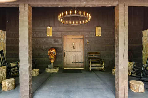 a view of a room with wooden floor