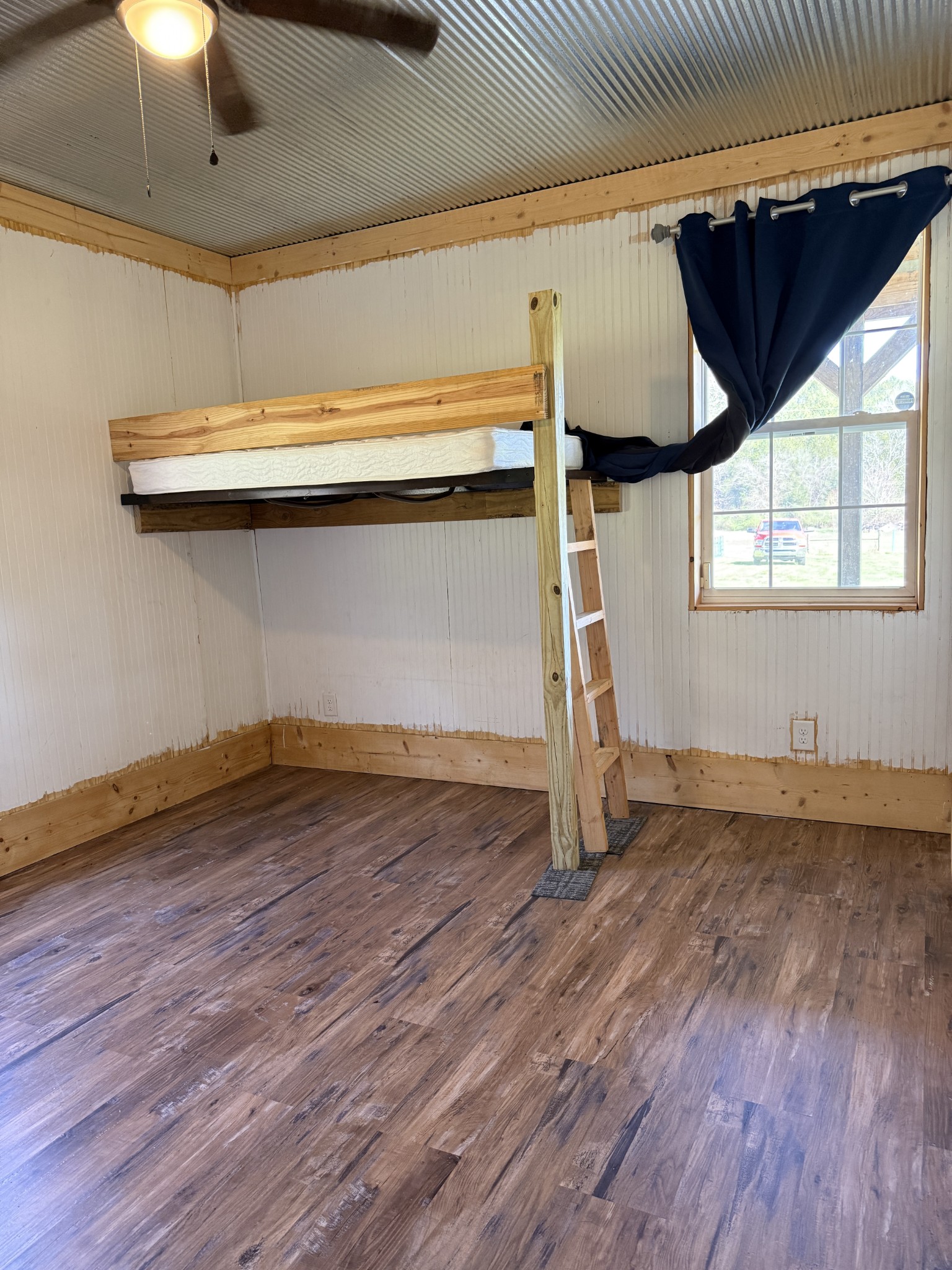 855 Lick Creek Road Hartsville, TN 37074 - Photo 30 of 76 a view of a room with wooden floor and window