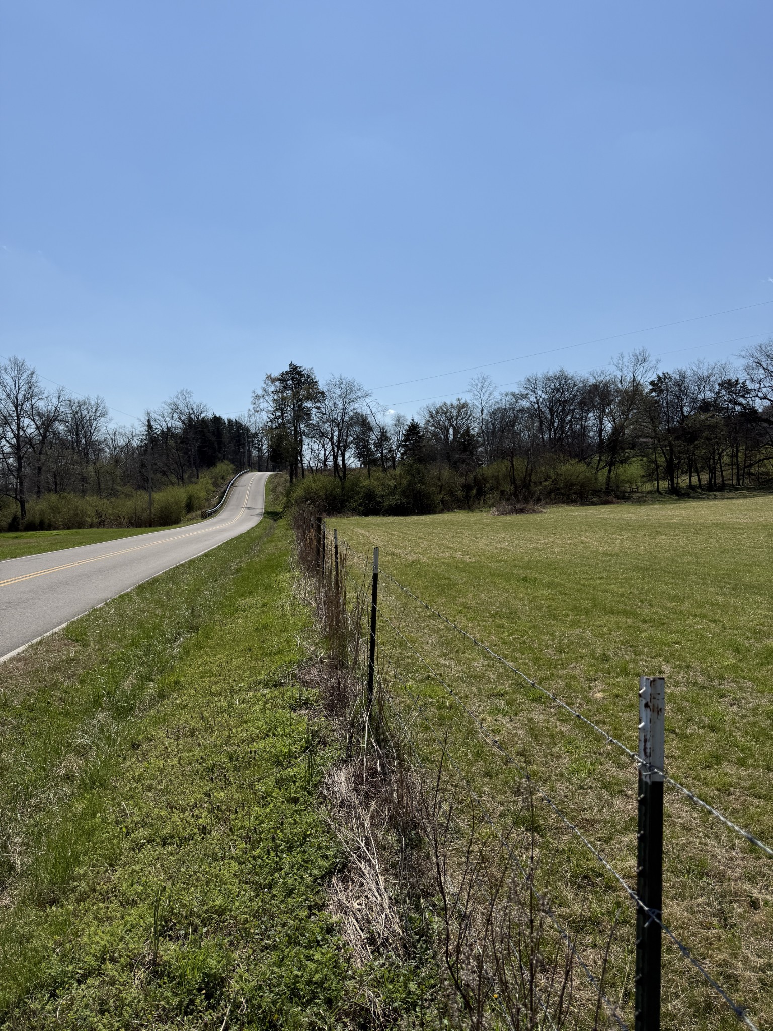 855 Lick Creek Road Hartsville, TN 37074 - Photo 6 of 76 a view of a lake with houses in the background