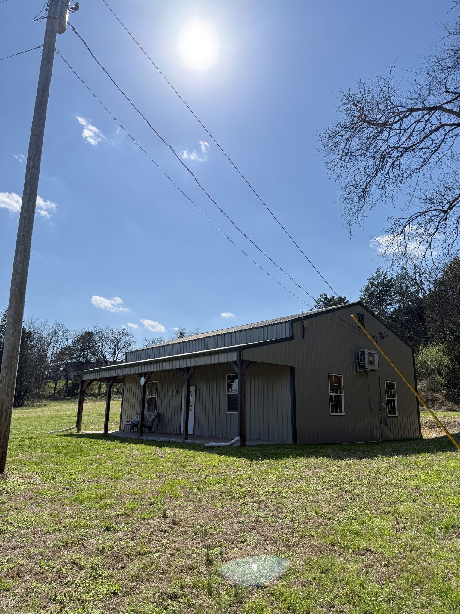 855 Lick Creek Road Hartsville, TN 37074 - Photo 8 of 76 a house view with a outdoor space