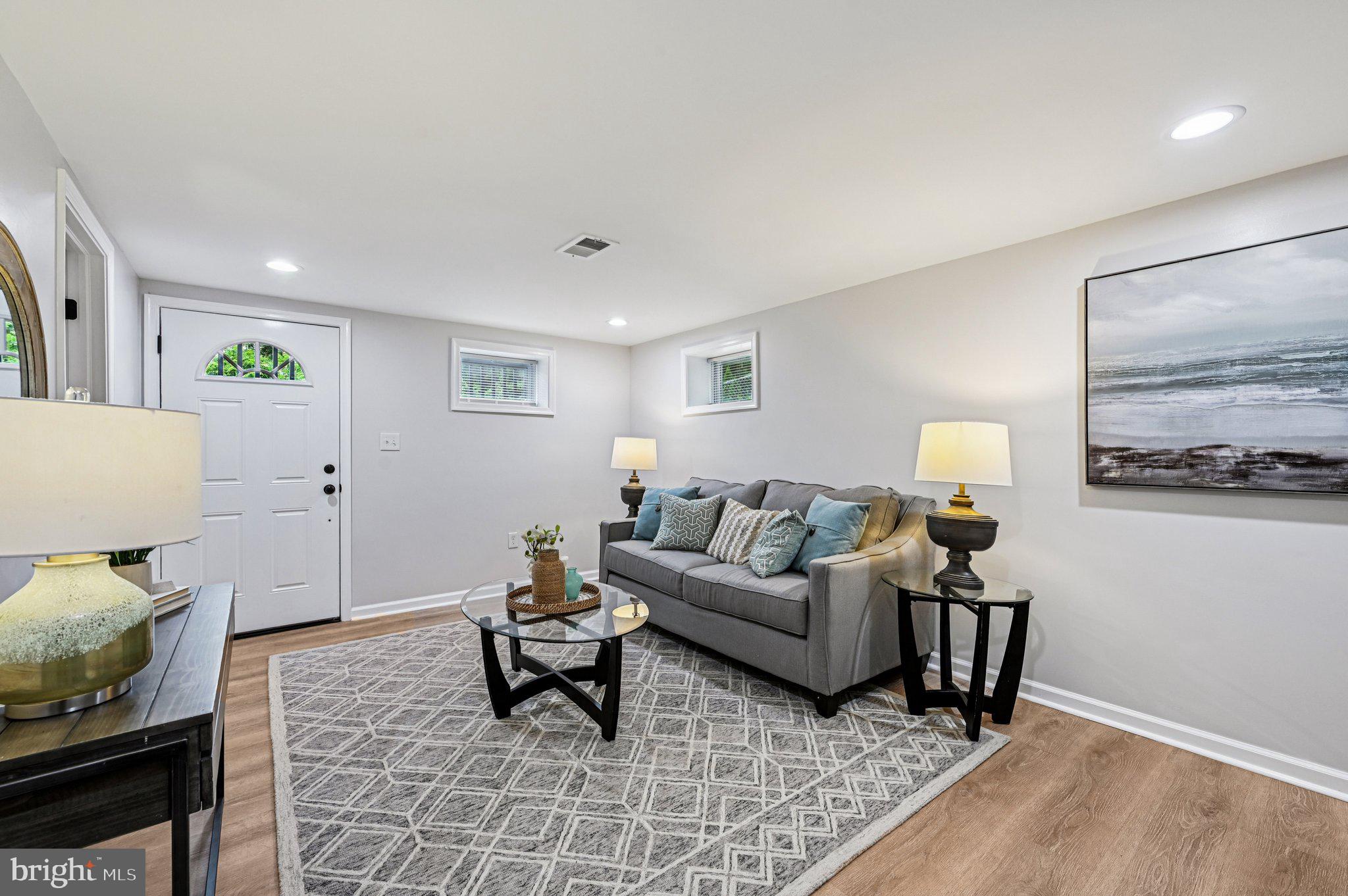 3569 Whiskey Bottom Road Laurel, MD 20724 - Photo 16 of 53 a living room with furniture and wooden floor