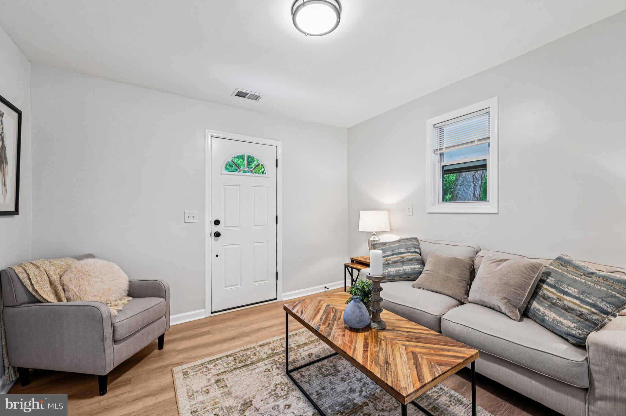 3569 Whiskey Bottom Road Laurel, MD 20724 - Photo 19 of 53 a living room with furniture and a window