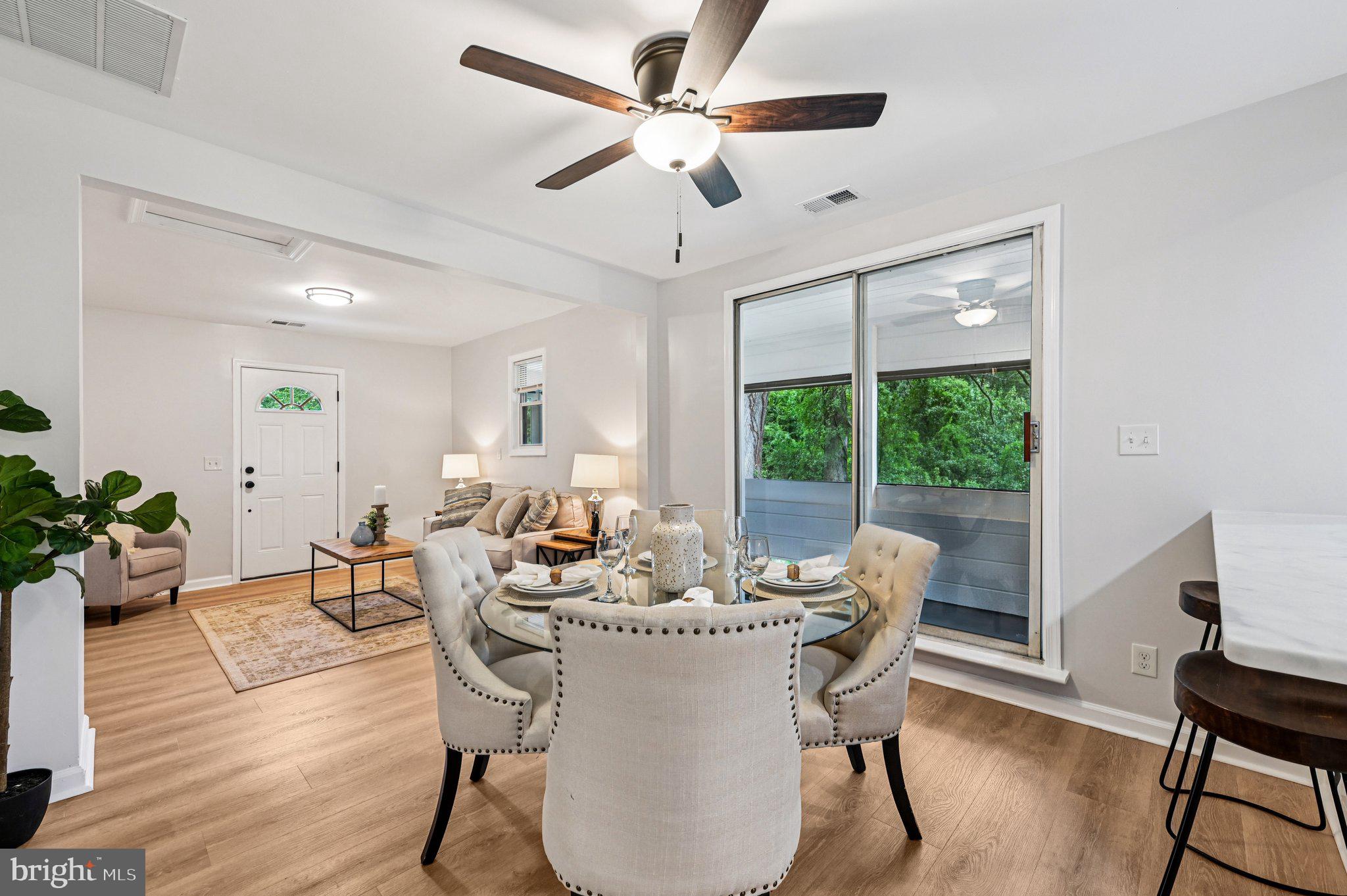 3569 Whiskey Bottom Road Laurel, MD 20724 - Photo 26 of 53 a dining room with furniture window and wooden floor