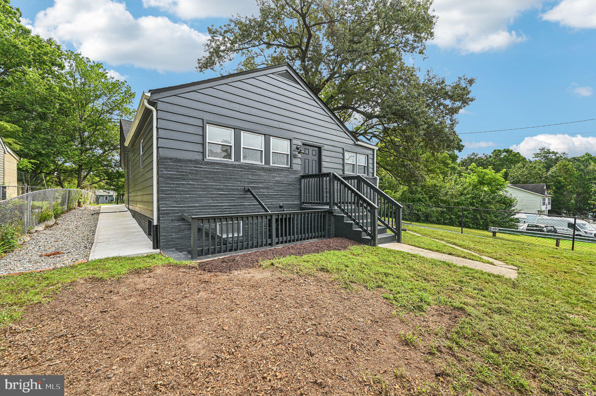 3569 Whiskey Bottom Road Laurel, MD 20724 - Photo 4 of 53 a front view of a house with a yard
