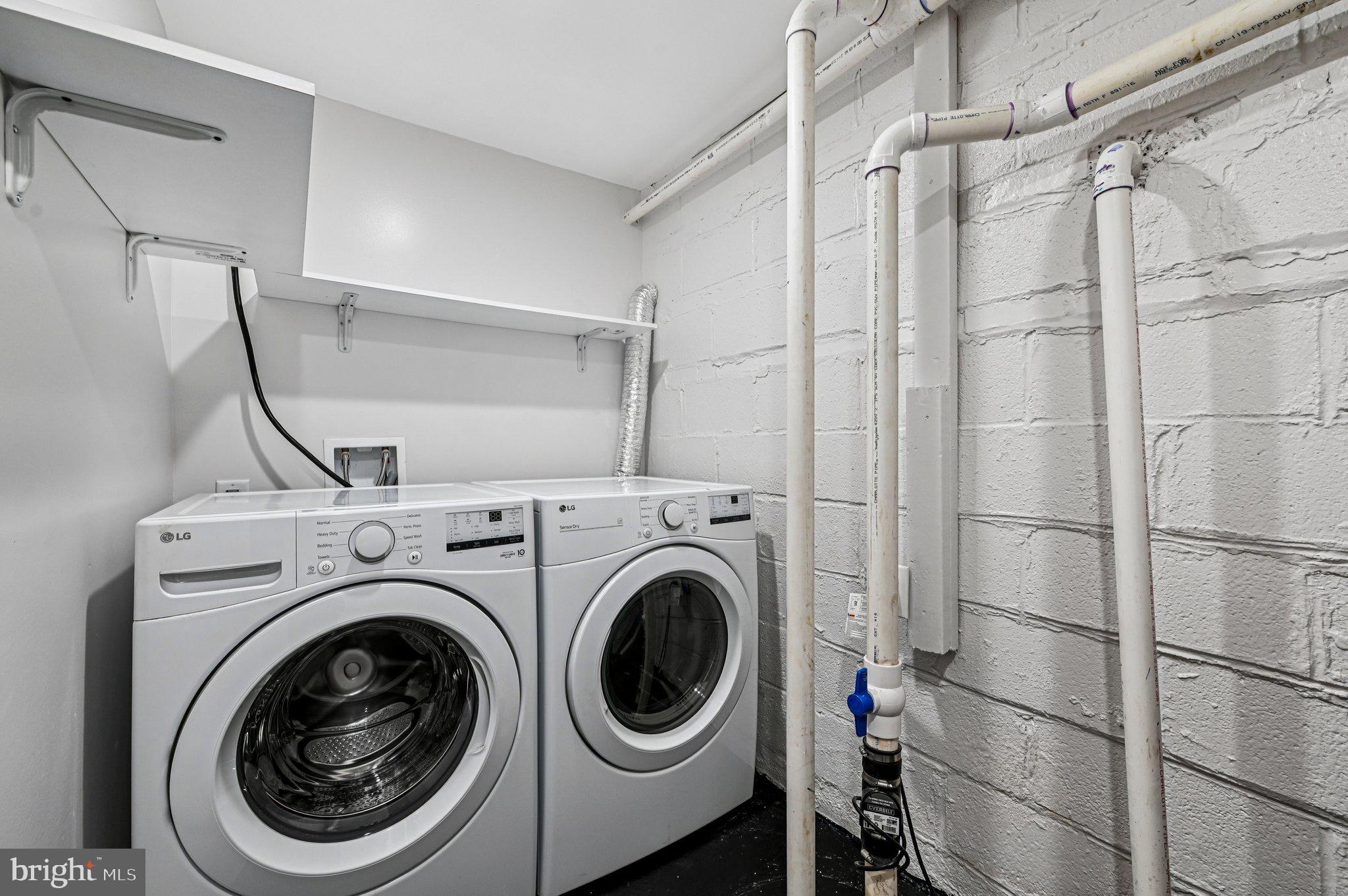 3569 Whiskey Bottom Road Laurel, MD 20724 - Photo 50 of 53 a utility room with dryer and washer