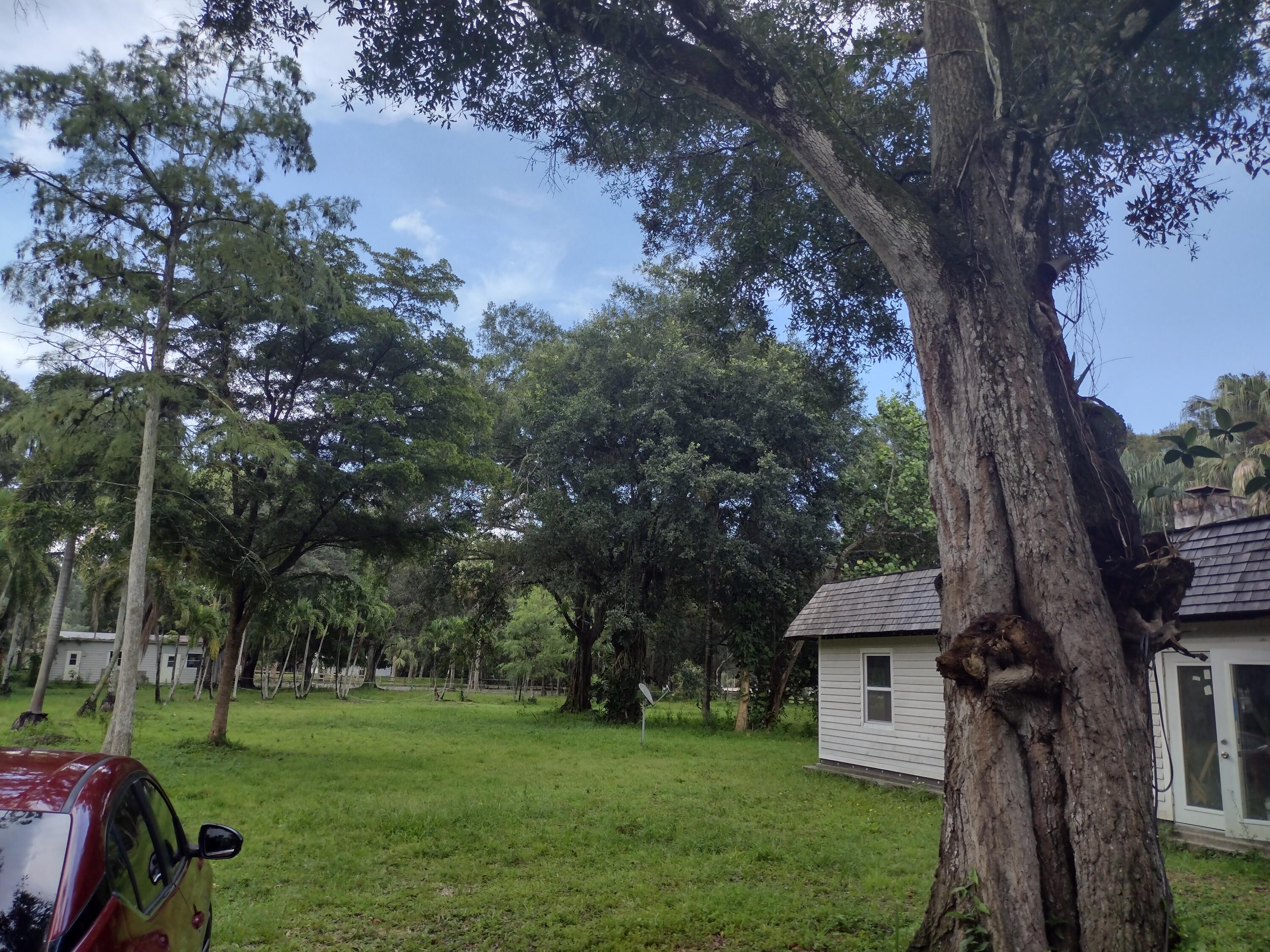 14717 Collecting Canal Road Loxahatchee, FL 33470 - Photo 1 of 6 IMG_20220712_152454980_HDR