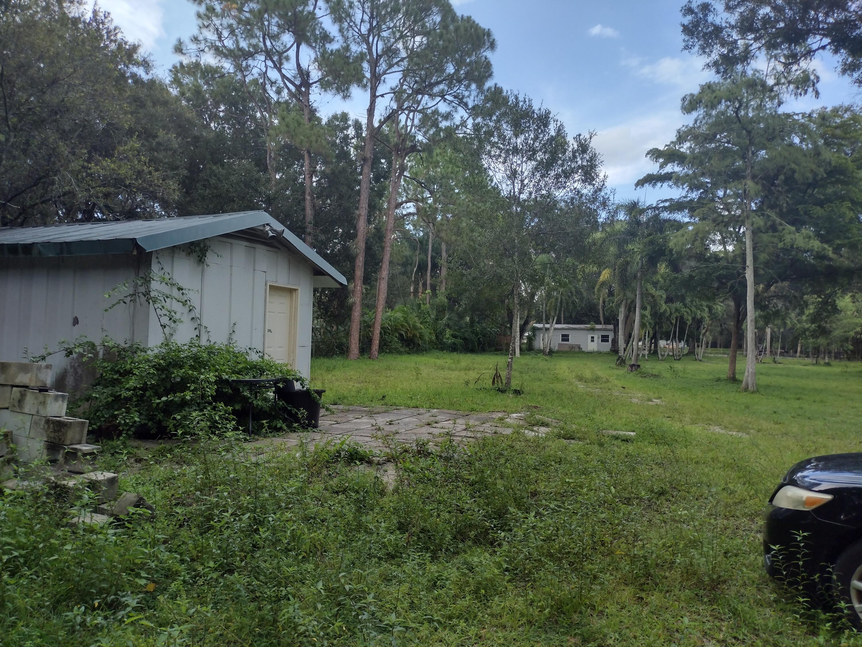 14717 Collecting Canal Road Loxahatchee, FL 33470 - Photo 3 of 6 IMG_20220712_152600477_HDR
