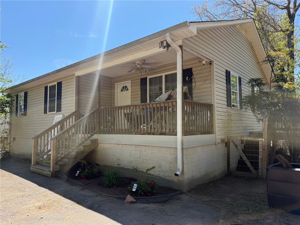 1155 Lake Jemiki Road Walhalla, SC 29691 - Photo 1 of 1 This charming home offers a welcoming facade with a covered porch, ideal for enjoying the outdoors.
