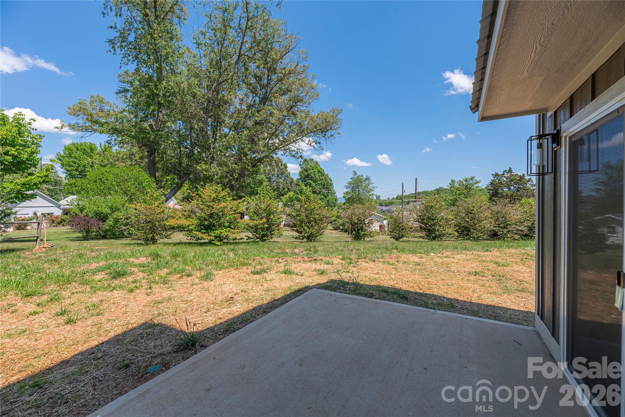 32 Oak Hill Road Candler, NC 28715 - Photo 23 of 29 a view of a yard and front view of a house