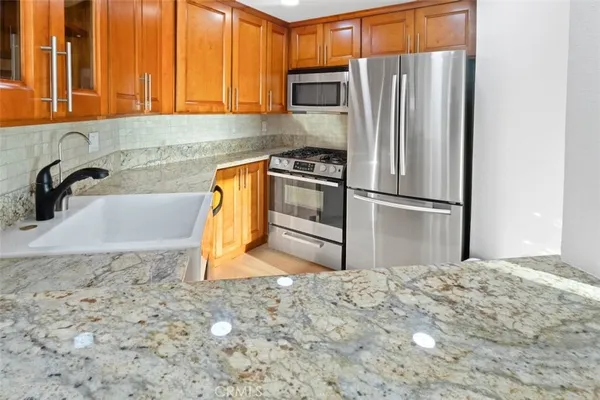 a view of staircase with white walls