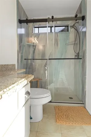 a view of a swimming pool with a lounge chairs