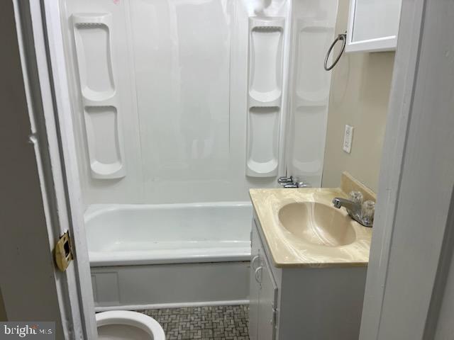 3905 Arden Road Richmond, VA 23222 - Photo 3 of 8 a bathroom with a sink a toilet and shower