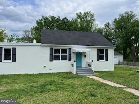 3905 Arden Road Richmond, VA 23222 - Photo 6 of 8 a front view of house with yard and green space