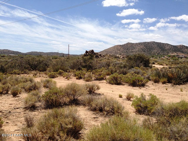 29 Spring Valley Road Hackberry, AZ 86411 - Photo 2 of 4 a view of a town with mountains in the background