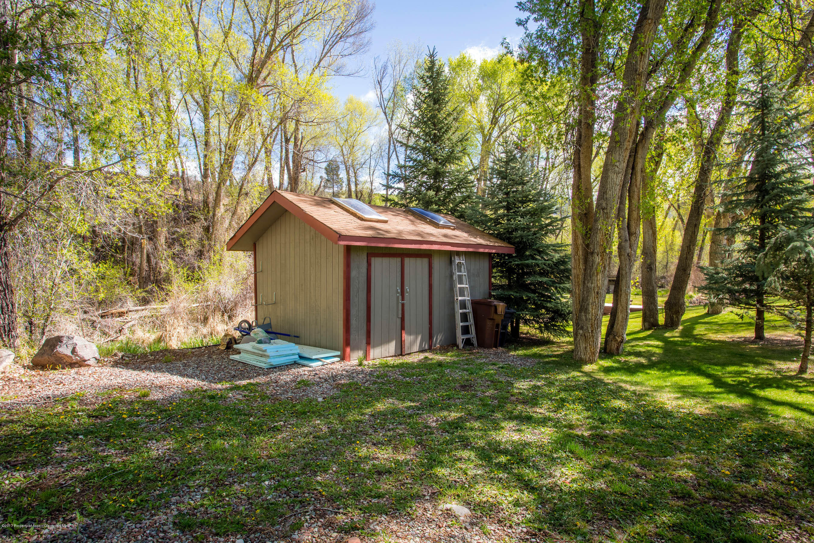 345 Lewis Lane Basalt, CO 81621 - Photo 23 of 26 a view of a house with yard and sitting area