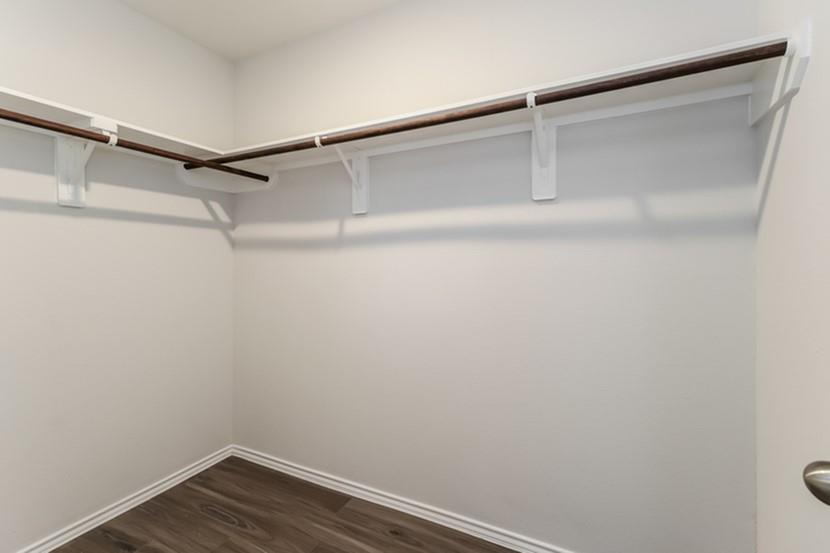 113 Arango Way Everman, TX 76140 - Photo 10 of 13 a view of an empty walk in closet