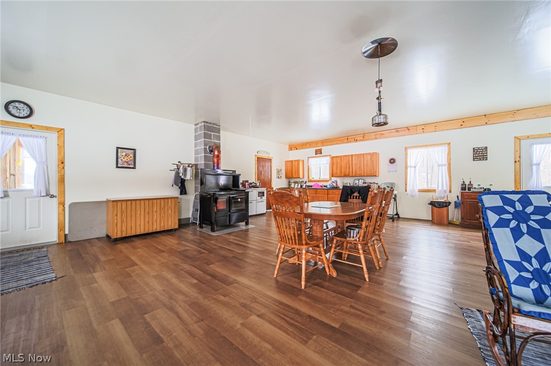 3542 Mann Road Andover, OH 44003 - Photo 6 of 42 Dining space featuring dark wood-style flooring
