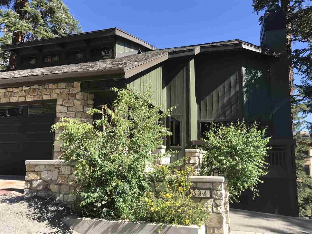 334 Davison Road Mammoth Lakes, CA 93546 - Photo 2 of 15 a view of a house with a small yard and plants