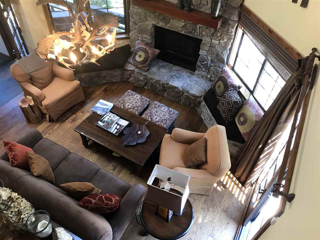 334 Davison Road Mammoth Lakes, CA 93546 - Photo 4 of 15 a living room with furniture and a fireplace