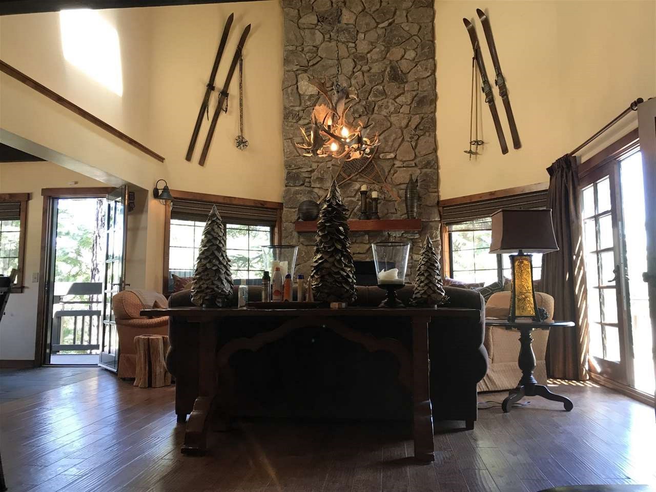 334 Davison Road Mammoth Lakes, CA 93546 - Photo 8 of 15 a living room with furniture and wooden floor