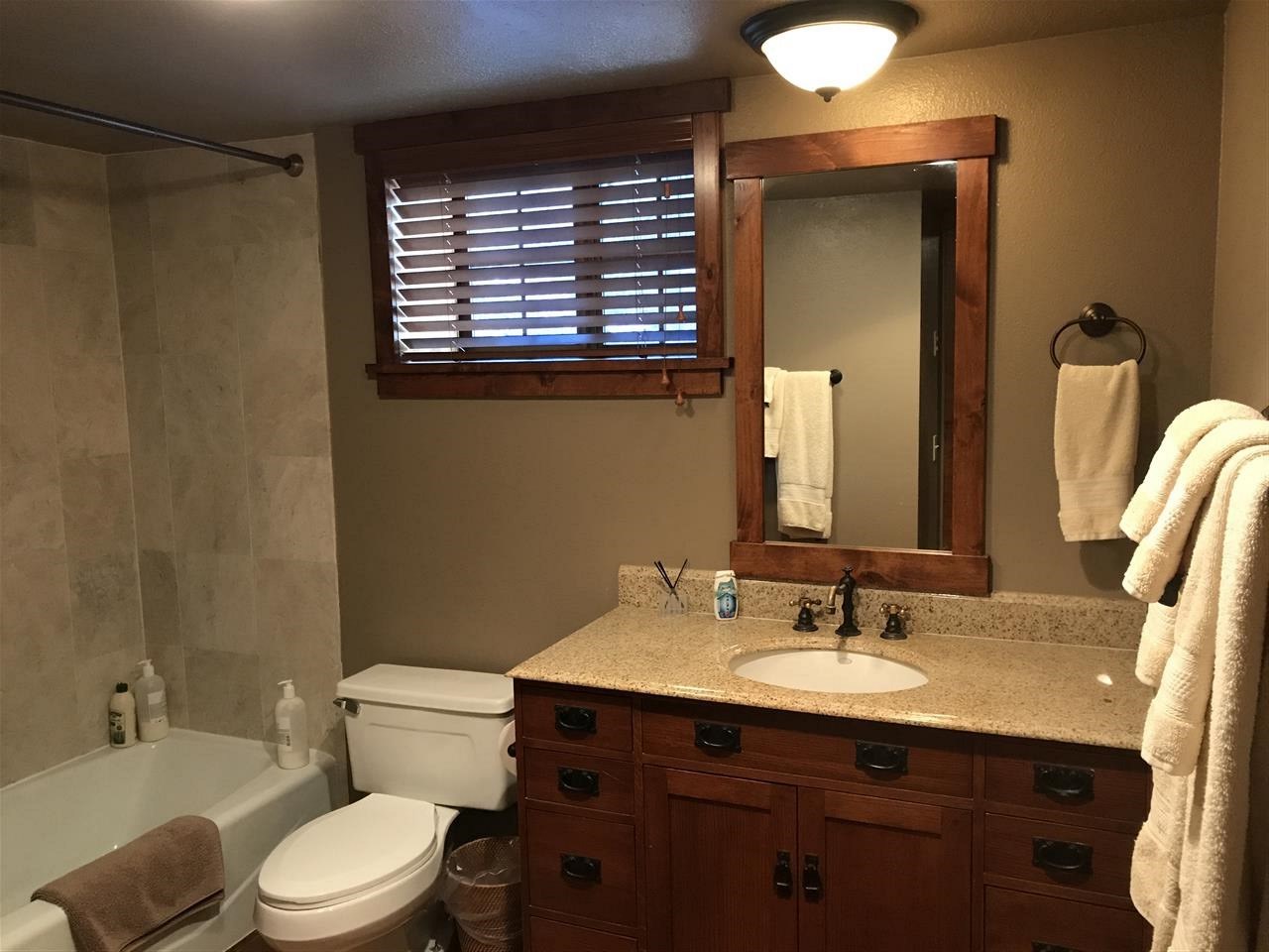 334 Davison Road Mammoth Lakes, CA 93546 - Photo 9 of 15 a bathroom with a sink vanity mirror and toilet